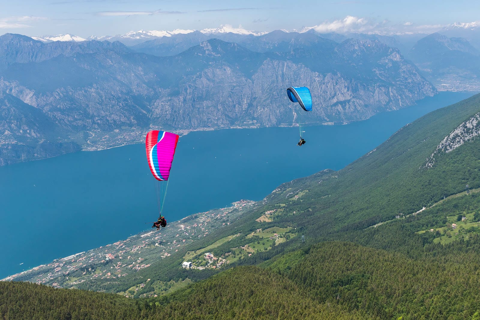 paragliders and lake garda view