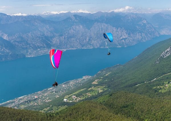 paragliders and lake garda view