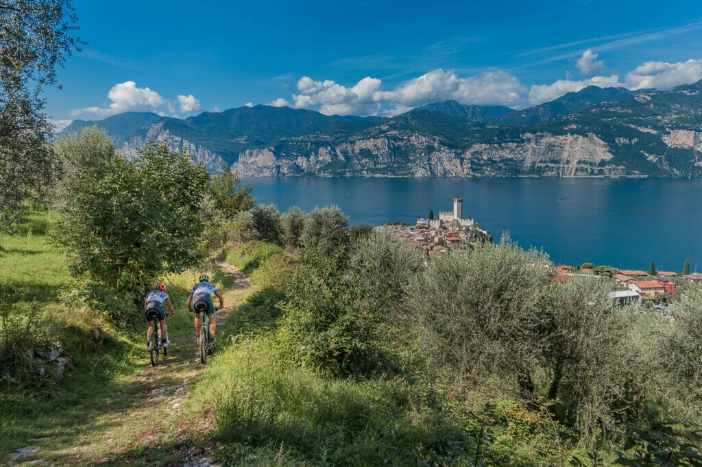 steep downhill by bike in malcesine with lake view